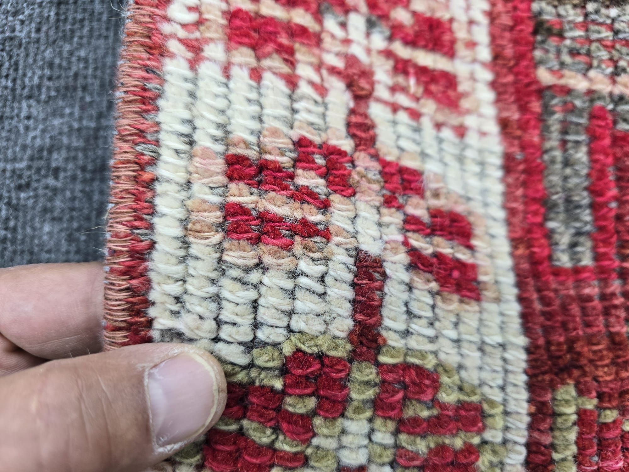 Vintage hand-knotted Anatolian runner rug, 2x12 feet, with vibrant red, orange, and gray geometric patterns, perfect for hallways and entryways.